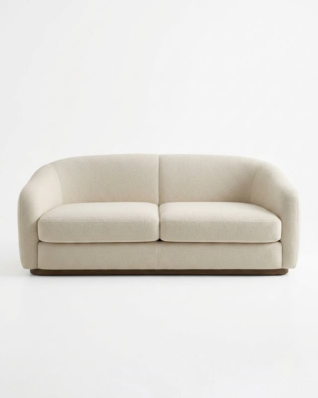 Cream Boucle Curved Two-Seat Sofa on Wood Plinth